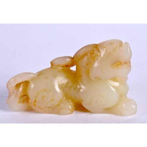 2205 - A CHINESE CARVED GREENISH WHITE JADE BEAST 20th Century. 3.75 cm x 6.25 cm.