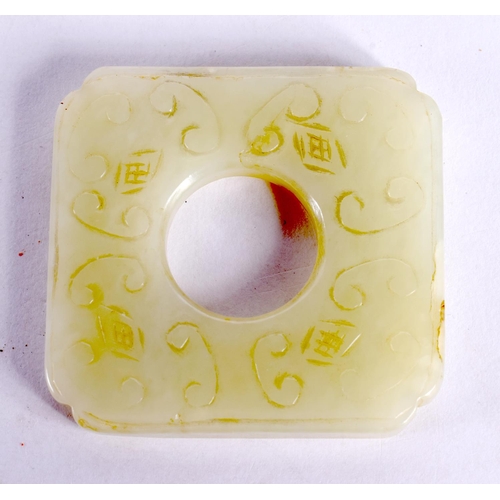 2207 - A 19TH CENTURY CHINESE CARVED GREEN JADE SQUARE DISC Qing. 5 cm square.