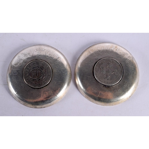 2208 - TWO CHINESE WHITE METAL COIN DISHES 20th Century. 221 grams. 9 cm diameter.