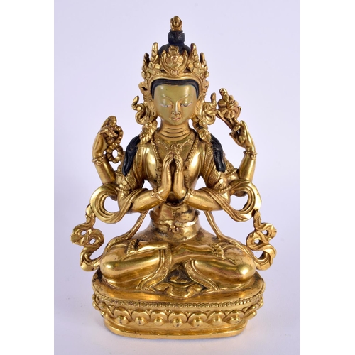 2216 - A 19TH/20TH CENTURY CHINESE TIBETAN GILT BRONZE BUDDHA modelled with clasped hands. 15 cm x 8 cm.