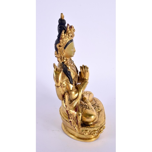 2216 - A 19TH/20TH CENTURY CHINESE TIBETAN GILT BRONZE BUDDHA modelled with clasped hands. 15 cm x 8 cm.