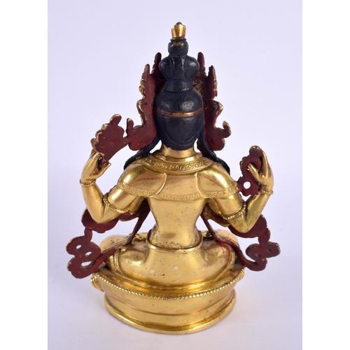 2216 - A 19TH/20TH CENTURY CHINESE TIBETAN GILT BRONZE BUDDHA modelled with clasped hands. 15 cm x 8 cm.