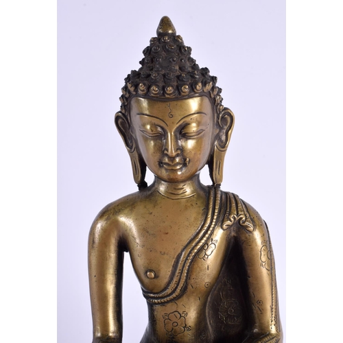 2217 - A 19TH CENTURY INDIAN TIBETAN BRONZE FIGURE OF A BUDDHA modelled upon a lotus base. 26 cm x 10 cm.