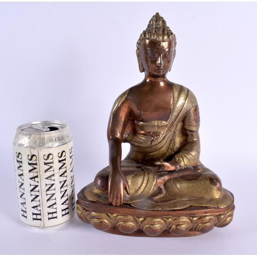 2218 - A 19TH CENTURY INDIAN TIBETAN FIGURE OF A BUDDHA modelled upon a lotus capped base. 25 cm x 14 cm.