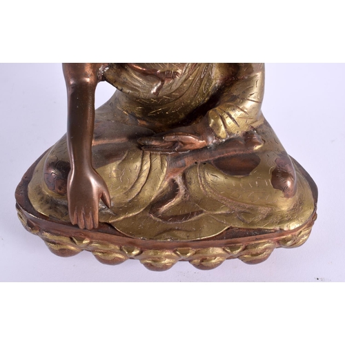 2218 - A 19TH CENTURY INDIAN TIBETAN FIGURE OF A BUDDHA modelled upon a lotus capped base. 25 cm x 14 cm.