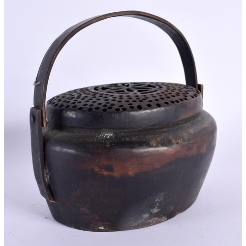 2219 - A CHINESE SWING HANDLED CENSER AND COVER 20th Century. 13 cm x 15 cm.