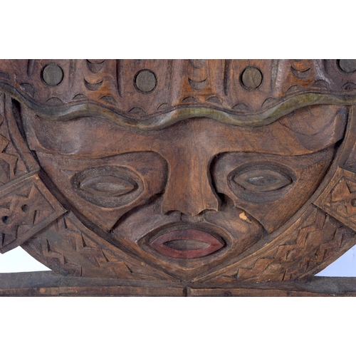 3707 - A large wooden South American carving 75 x 45 cm.