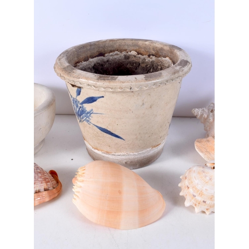 3779 - A large glazed pottery garden pot together with  stone pestle and mortar together with a collection ... 