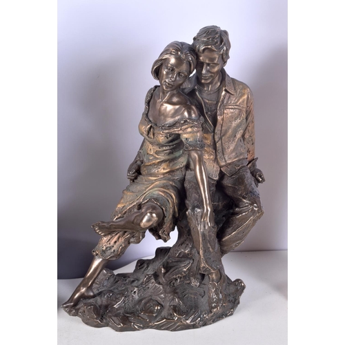 3787 - A cold painted bronze figure of a fieldworker together with a bronzed figure of a couple and a pair ... 