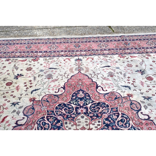 3840 - A large country house rug 500 x 420 cm .