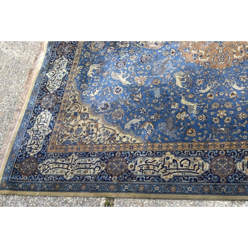 3841 - A large blue ground Indian rug 368 x 320 cm.