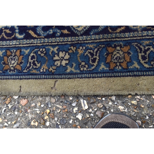 3841 - A large blue ground Indian rug 368 x 320 cm.