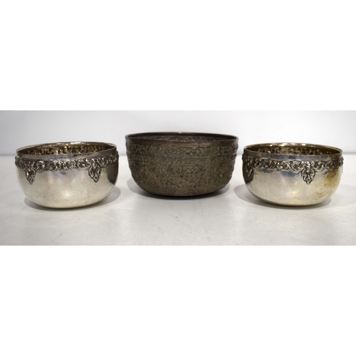 1459 - THREE MIDDLE EASTERN WHITE METAL BOWLS. 262 grams. Largest