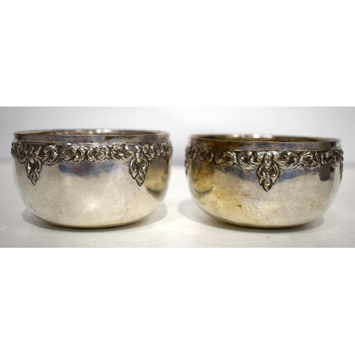 1459 - THREE MIDDLE EASTERN WHITE METAL BOWLS. 262 grams. Largest