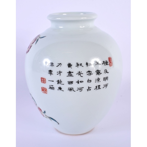 1849 - A CHINESE REPUBLICAN PERIOD FAMILLE ROSE VASE painted with flowers. 14 cm x 7 cm.