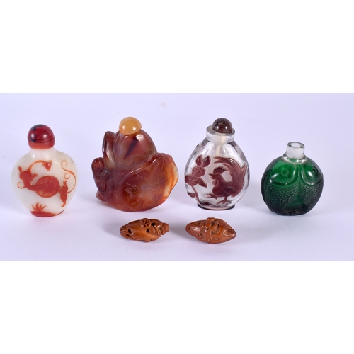 1853 - FOUR EARLY 20TH CENTURY CHINESE SNUFF BOTTLES Late Qing/Republic, together with two nuts. Largest 6 ... 