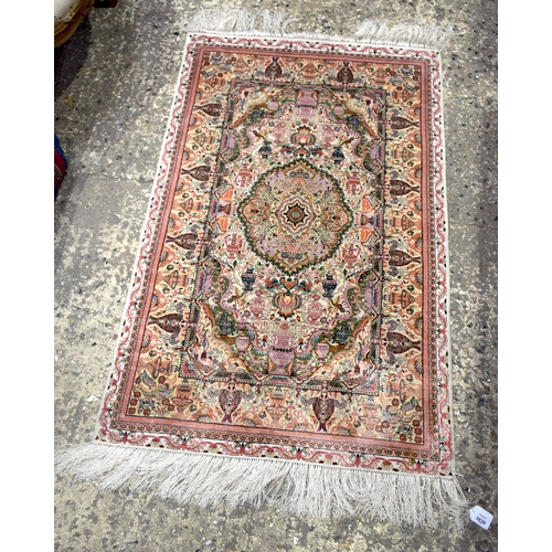 3839 - A small Islamic silk rug 122 x 77 cm .