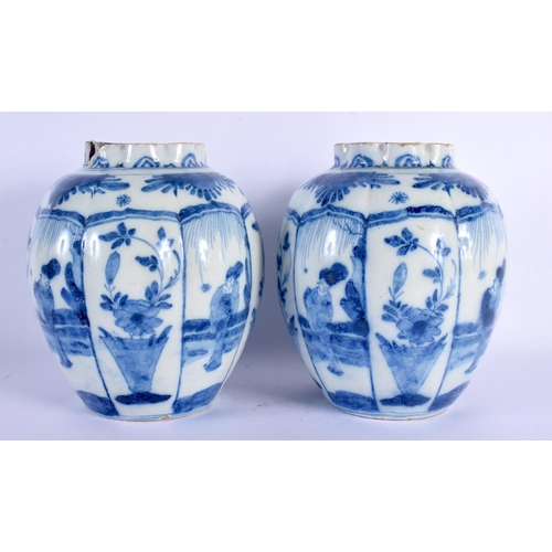 10 - A PAIR OF 18TH CENTURY DUTCH DELFT BLUE AND WHITE LOBED VASES painted with Oriental figures in lands... 