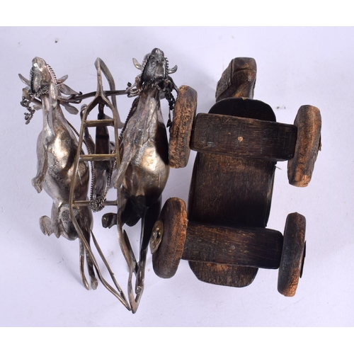 102 - A CHARMING INDIAN CARVED WOOD TOY HORSE together with a white metal oxen group. Oxen 106 grams. Larg... 