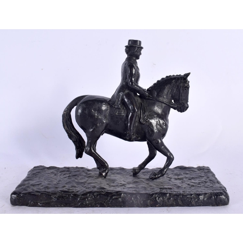 106 - Edwin Johnson (19th/20th Century) Bronze, Dressage rider. 16 cm x 14 cm.