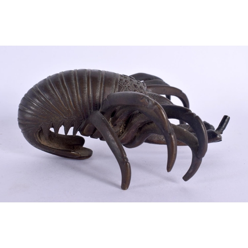 112 - A RARE 19TH CENTURY JAPANESE MEIJI PERIOD BRONZE OKIMONO formed as a coiled lobster. 11 cm x 9 cm.