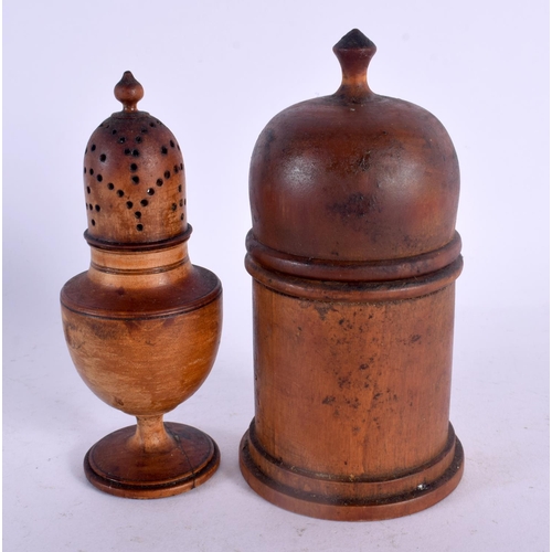 128 - AN ANTIQUE TREEN CARVED WOOD PEPPER POT together with a similar box and cover. Largest 16 cm high. (... 