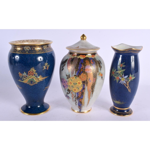 133 - TWO ART DECO CROWN DEVON VASES and a Carlton ware vase. Largest 16 cm high. (3)