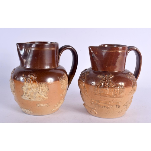 142 - A 19TH CENTURY DOULTON STONEWARE HUNTING JUGS together with five others. Largest 25.5 cm high. (6)