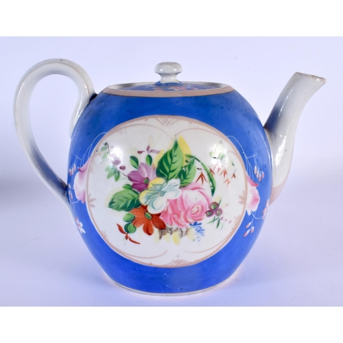 156 - A RARE 19TH CENTURY RUSSIAN PORCELAIN TEAPOT AND COVER painted with flowers. 21 cm x 15 cm.