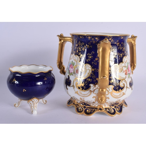 169 - Royal Crown Derby cobalt blue loving cup painted with flowers and a footed Royal Crown derby vase pa... 