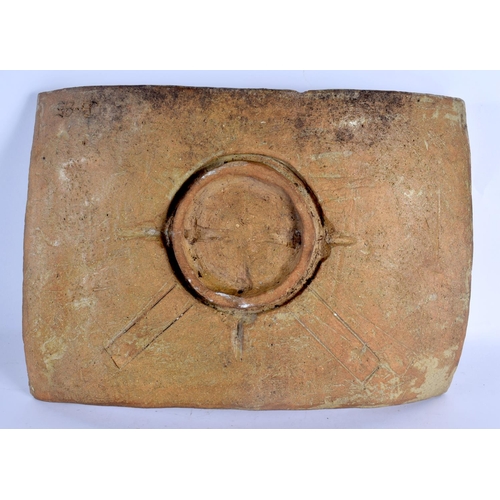 23 - A LARGE 1980S STUDIO POTTERY STONEWARE CURVING PLAQUE depicting an abstract bird. 38 cm x 30 cm.