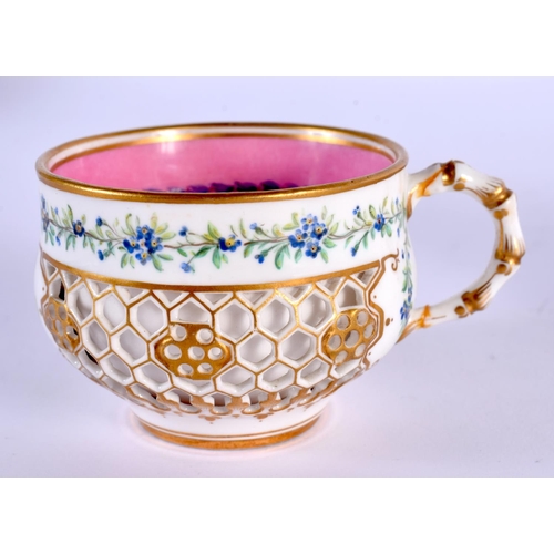 259 - 19th century Royal Worcester reticulated teacup and a saucer similar both with circular Royal Worces... 