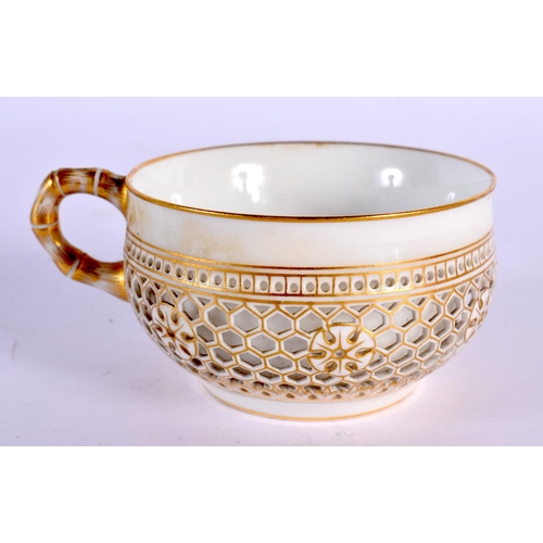 260 - Early 20th century Sevres reticulated teacup with pierced outer wall, two Sevres marks to base.  9.5... 