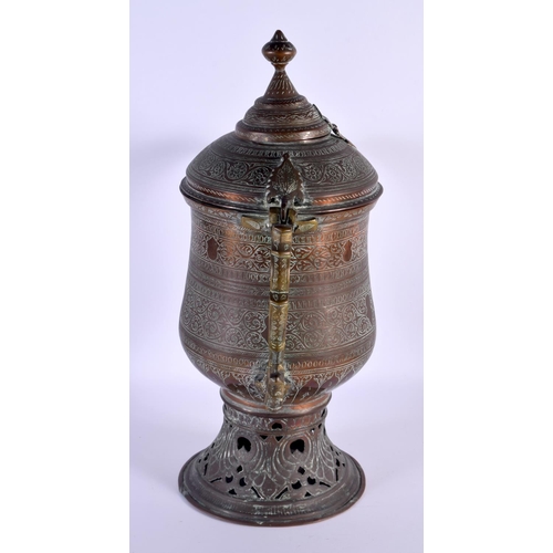 293 - A LARGE ANTIQUE MIDDLE EASTERN COPPER ALLOY TEA URN with pierced base. 43 cm x 22 cm.