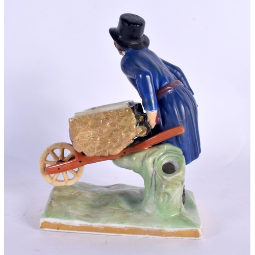 30 - A RARE ANTIQUE RUSSIAN PORCELAIN FIGURE OF A MALE modelled holding a barrow upon a naturalistic base... 