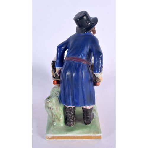 30 - A RARE ANTIQUE RUSSIAN PORCELAIN FIGURE OF A MALE modelled holding a barrow upon a naturalistic base... 