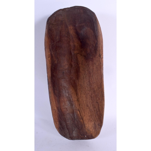 302 - A VINTAGE ABORIGINAL TRIBAL CARVED WOOD FOOD SCOOP decorated all over with motifs. 22 cm x 10 cm.