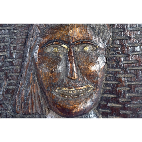 304 - AN UNUSUAL VINTAGE TRIBAL CARVED WOOD M?ORI ABORIGINAL PANEL depicting a nude female. 21 cm x 14 cm.