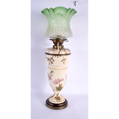 305 - A LARGE ANTIQUE ENGLISH COUNTRY HOUSE POTTERY OIL LAMP decorated with foliage. 58 cm high.