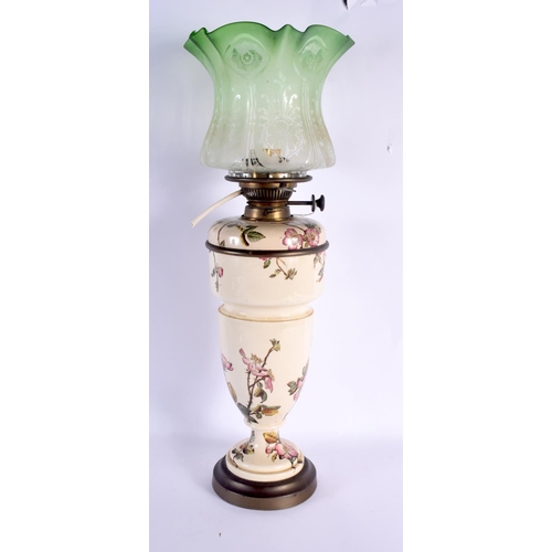 305 - A LARGE ANTIQUE ENGLISH COUNTRY HOUSE POTTERY OIL LAMP decorated with foliage. 58 cm high.