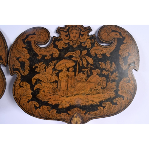 314 - A PAIR OF REGENCY COUNTRY HOUSE PEN WORK LACQUER FANS depicting figures in landscapes. 21 cm x 38 cm... 