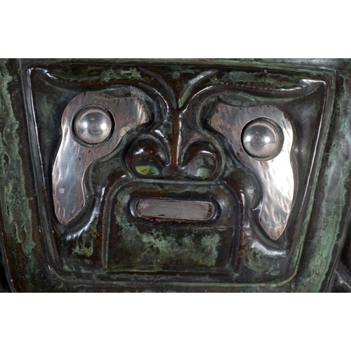 315 - AN UNUSUAL 1970S CONTINENTAL SILVER AND MIXED METAL PLAQUE depicting an Aztec type portrait. 30 cm s... 