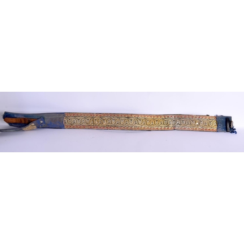 317 - AN ANTIQUE MIDDLE EASTERN YEMENI OMANI CARVED RHINOCEROS HORN JAMBIYA DAGGER with matching belt stra... 