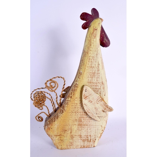 319 - A CONTEMPORARY FOLK ART CHICKEN. 32 cm x 12 cm.