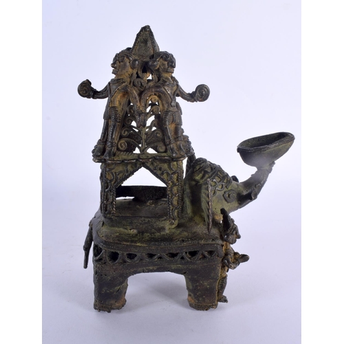 323 - A 19TH CENTURY TRIBAL BENIN BRONZE FIGURE OF AN ELEPHANT modelled with numerous figures on board. 15... 