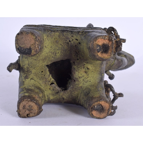 323 - A 19TH CENTURY TRIBAL BENIN BRONZE FIGURE OF AN ELEPHANT modelled with numerous figures on board. 15... 