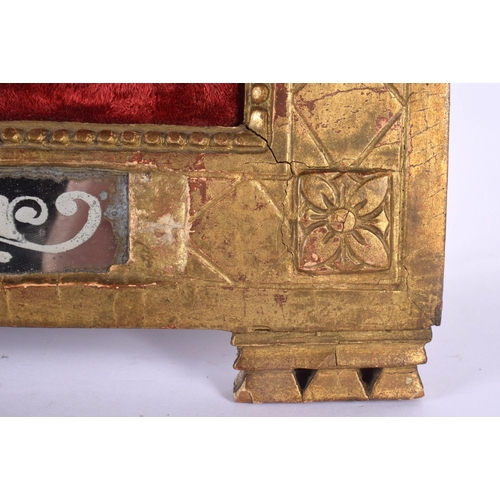 326 - AN 18TH CENTURY CONTINENTAL CARVED BOXWOOD AND EGLOMISE GLASS CORPUS CHRISTI upon an original red ve... 