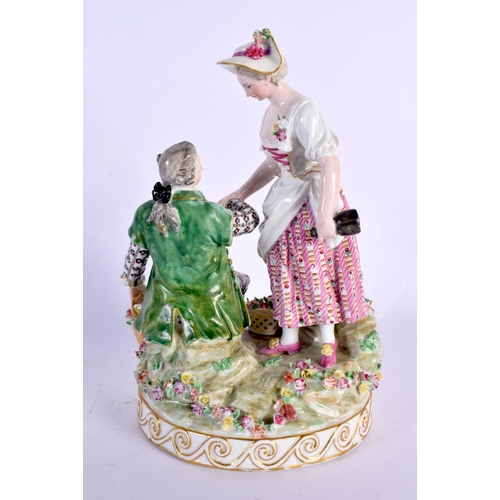 33 - A 19TH CENTURY MEISSEN PORCELAIN FIGURAL GROUP depicting a gallant and female amongst foliage. 22 cm... 