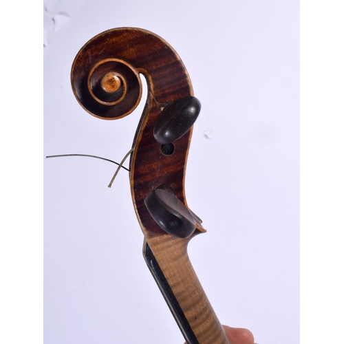336 - A CASED VIOLIN. 58.5 cm long, length of back 36.5 cm.