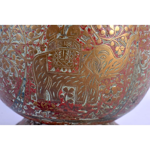 338 - AN EARLY 20TH CENTURY INDIAN KASHMIRI ENAMELLED BRASS BUCKET together with a swan vase. Largest 29 c... 